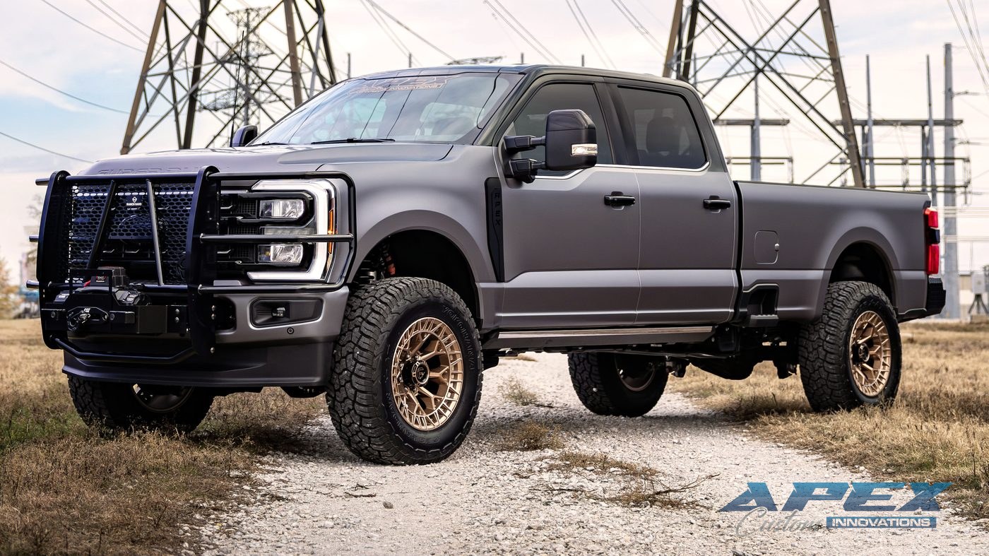 Lifted Ford F-350 on bronze wheels built by Apex Custom Innovations