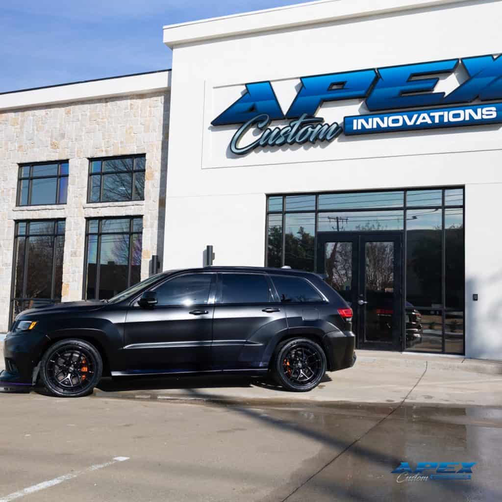 2018 Jeep Grand Cherokee Trackhawk with Vossen HFX-1 wheels, Nitto tires, matte black wrap, and Waido widebody kit built by Apex Custom Innovations in Dallas Texas