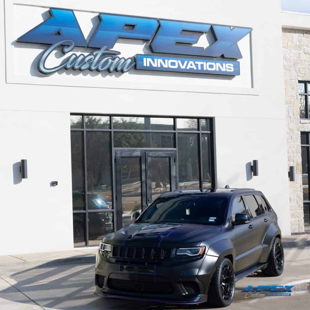 2018 Jeep Grand Cherokee Trackhawk with Vossen HFX-1 wheels, Nitto tires, matte black wrap, and Waido widebody kit built by Apex Custom Innovations in Dallas Texas