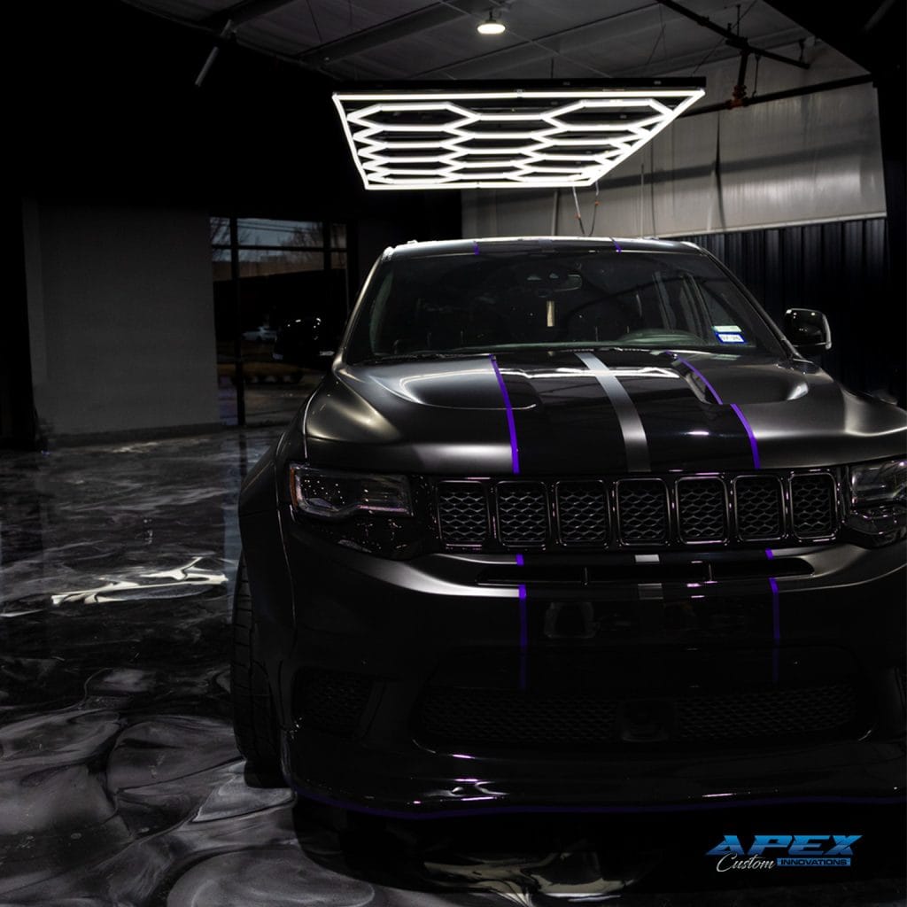 2018 Jeep Grand Cherokee Trackhawk with Vossen HFX-1 wheels, Nitto tires, matte black wrap, and Waido widebody kit built by Apex Custom Innovations in Dallas Texas