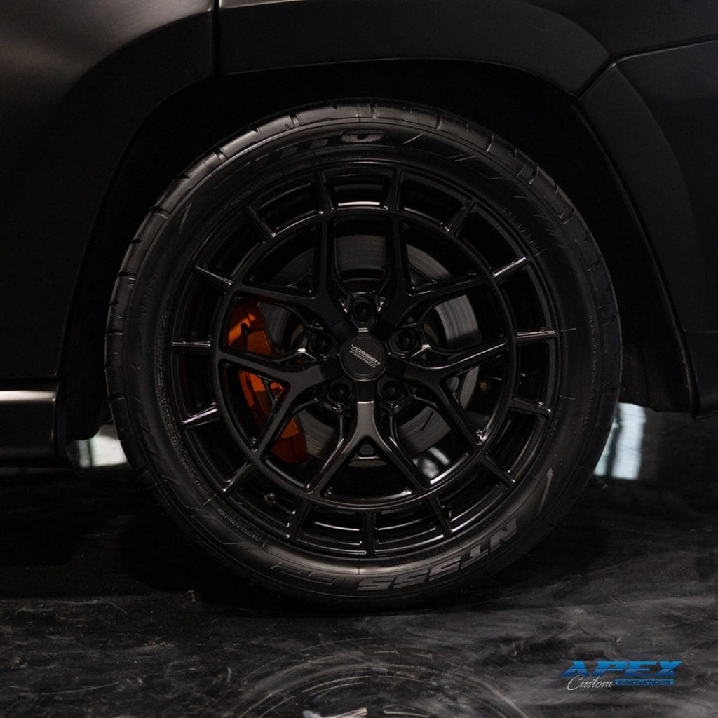 2018 Jeep Grand Cherokee Trackhawk with Vossen HFX-1 wheels, Nitto tires, matte black wrap, and Waido widebody kit built by Apex Custom Innovations in Dallas Texas