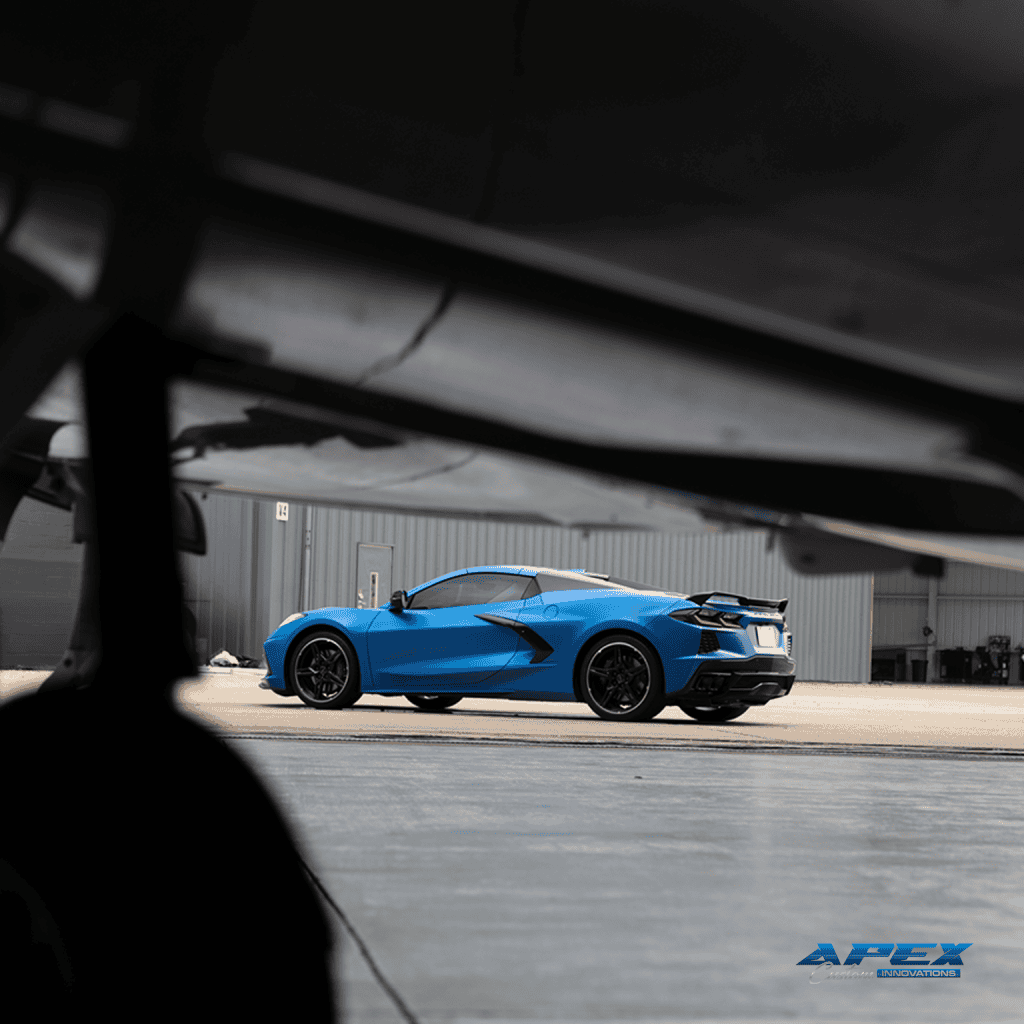 2024 Chevrolet Corvette Stingray with Apex Armor paint protection film installed by Apex Custom Innovations inside aircraft hangar