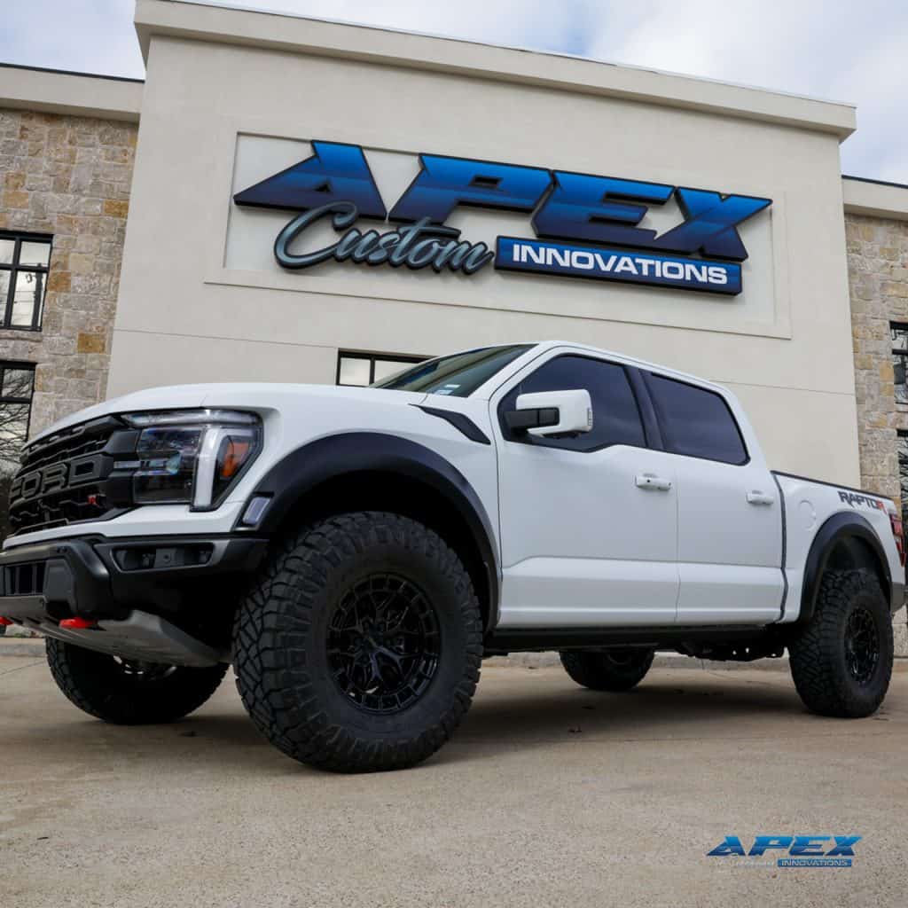 2025 Ford F-150 Raptor R with Vossen HFX1 wheels and Nitto Ridge Grappler tires photographed in the Apex Custom Innovations studio in Dallas Texas