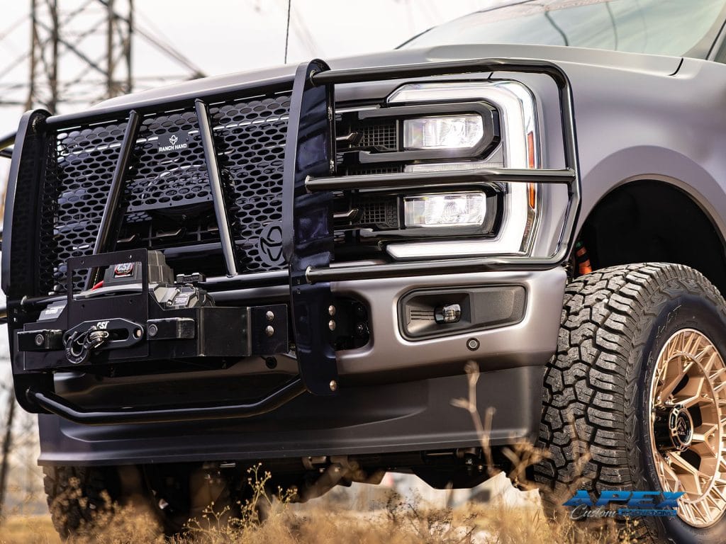 Ranch Hand grille guard with integrated winch on a 2025 Ford F-350 with Fuel Off-Road wheels and Yokohama tires by Apex Custom Innovations