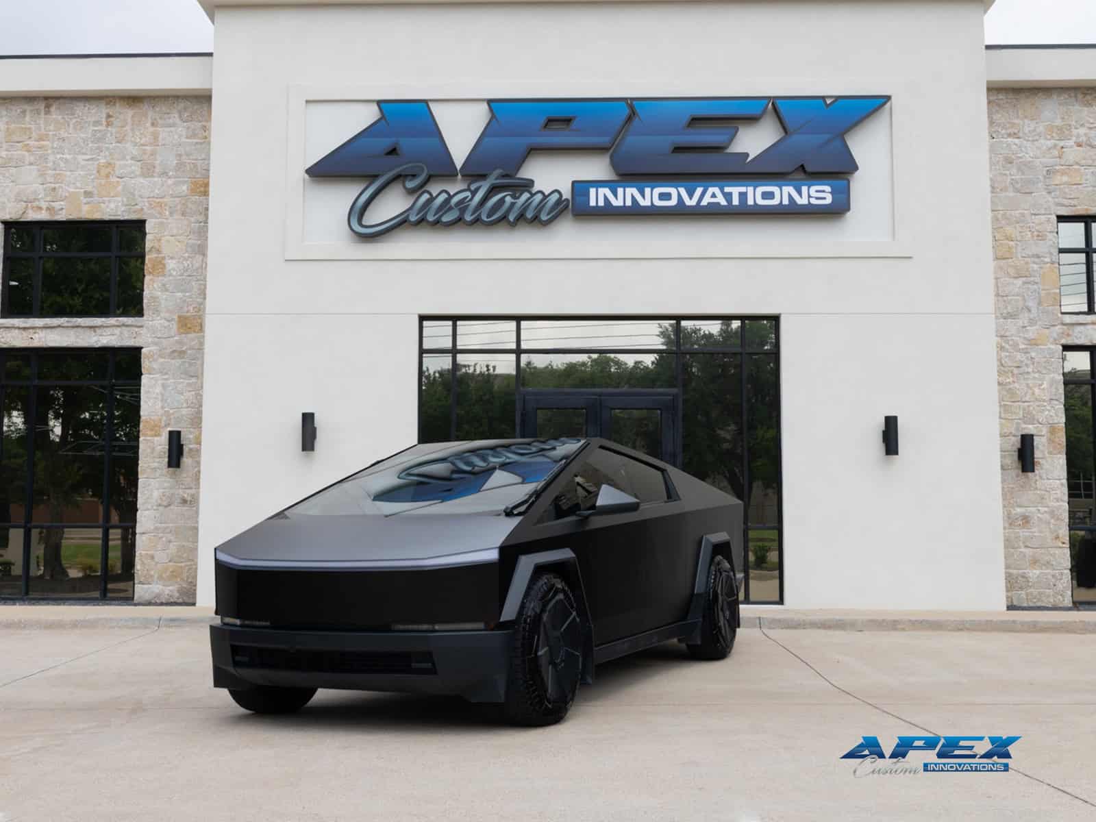 Hero shot of 2024 Tesla Cybertruck with satin black wrap completed by Apex Custom Innovations