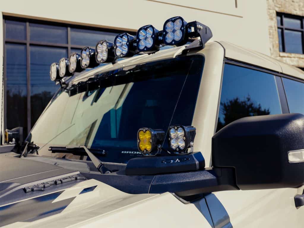 2025 Ford Bronco Raptor with Baja Designs windshield LED light bar and dual A-pillar lights by Apex Custom Innovations