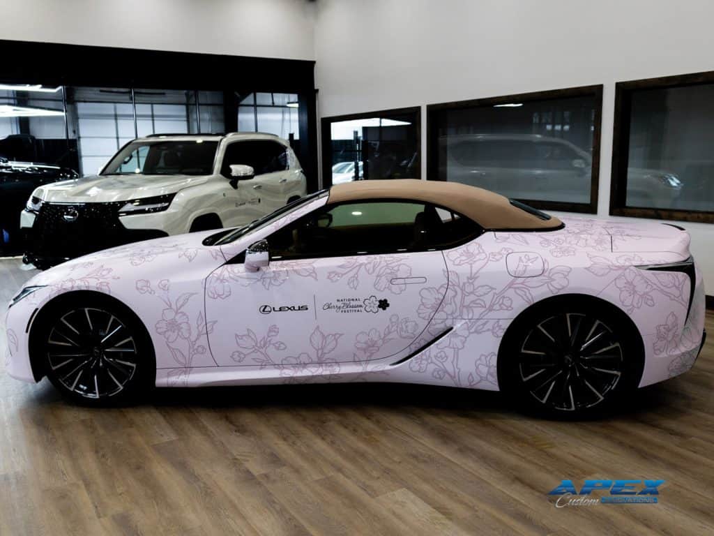 Lexus LC500 with pale pink Cherry Blossom vinyl wrap and National Cherry Blossom Festival graphics